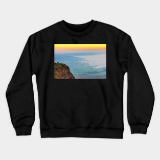 Man meditating at sunrise on Mam Tor, Castleton, Derbyshire,UK Crewneck Sweatshirt